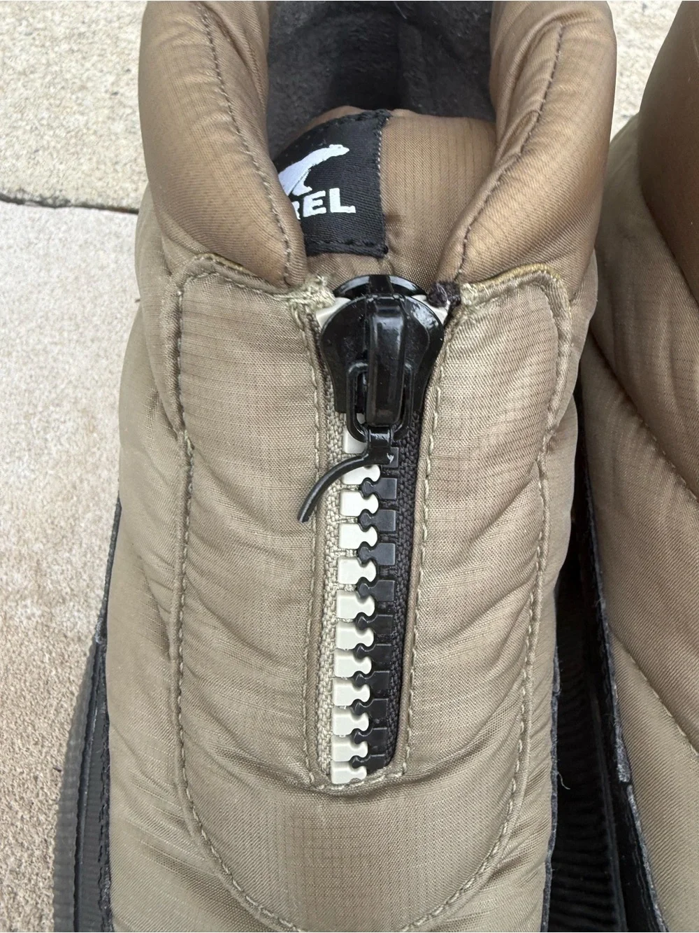 Sorel Olive Green and Black Quilted Slip-On Winter Sneakers with Pink Accent